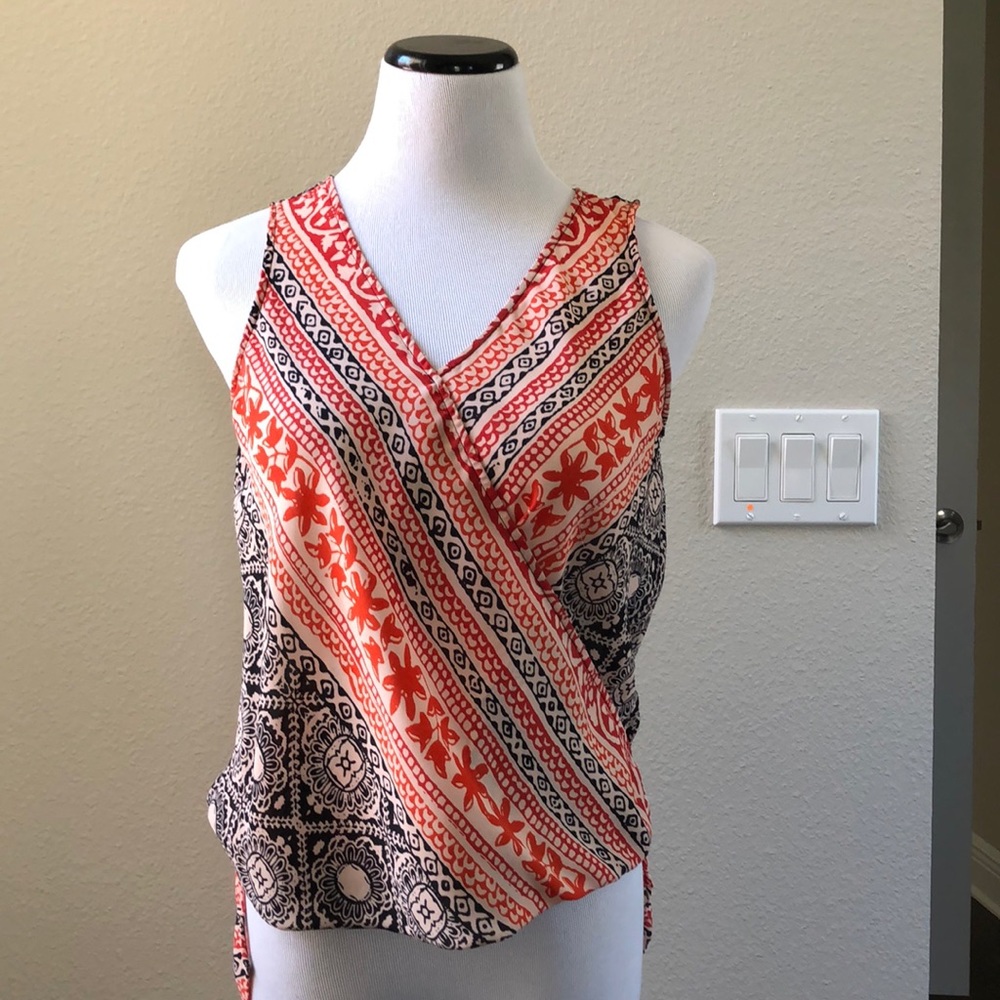 Sleeveless faux wrap blouse
